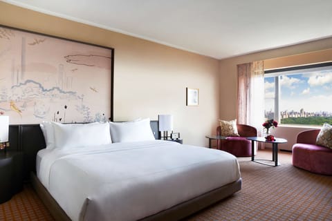 Sink into crisp linens and gaze out over the city.