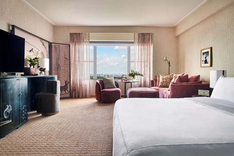 Unwind by the window with city views and plush seating.