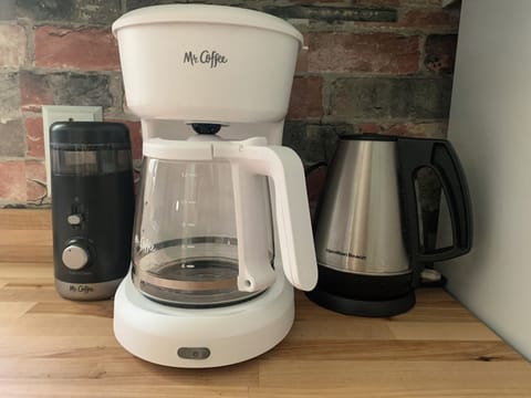 Coffee pot, grinder, and electric tea kettle.