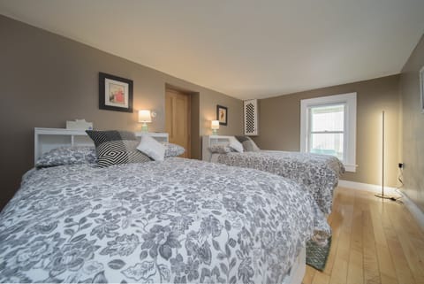 first floor bedroom with two full size beds