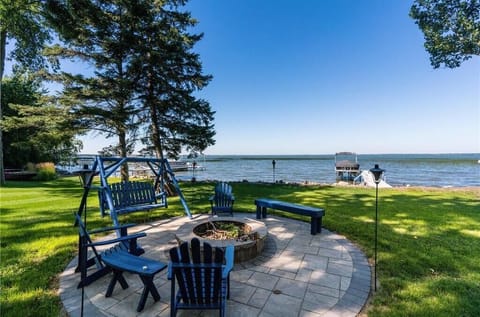 Plentiful seating, great views, fire pit and yard space and beach to enjoy.