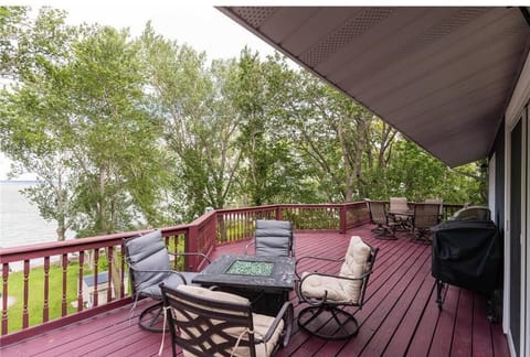 Enjoy grilling and the expansive outdoor deck with plentiful seating.