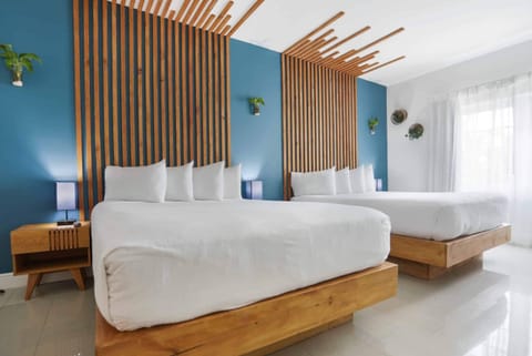 Bedroom. Exact unit will be assigned upon arrival. Views, colors and decor may vary.