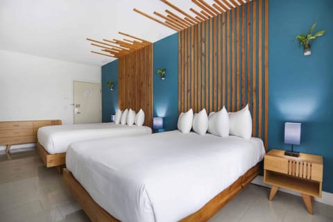 Bedroom. Exact unit will be assigned upon arrival. Views, colors and decor may vary.