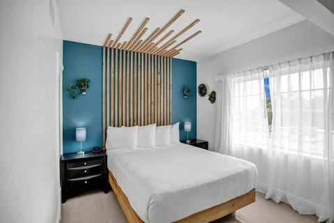 Bedroom. Exact unit will be assigned upon arrival. Views, colors and decor may vary.