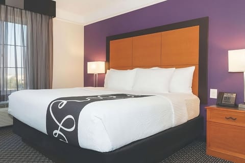 Drift off comfortably in a bright, freshly styled king bed.