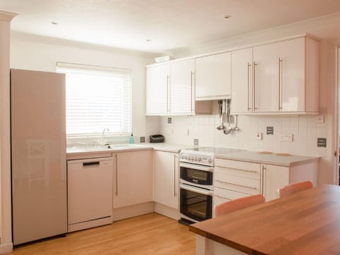 Cabinetry, Sink, Countertop, Furniture, Kitchen Sink, Kitchen, Window, Wood, Kitchen Stove, Interior Design