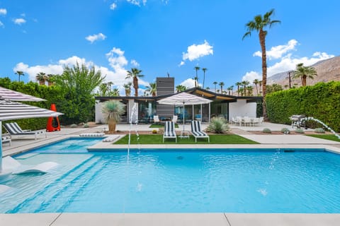 Dive into paradise at our stunning outdoor pool, perfectly positioned to offer breathtaking views of the majestic mountains. Whether you choose to take a refreshing dip or lounge poolside on a warm day, this serene oasis invites you to unwind.