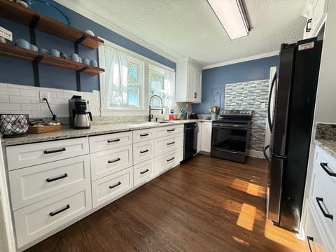 Fully stocked with coffee bar area, front door frig, stove with air fryer.