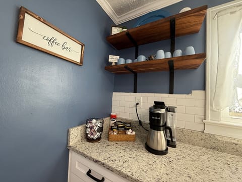 Coffee area with Keurig Duo (drip/pods). The home also has a hot water kettle.