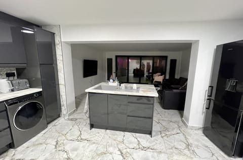 Open plan views of kitchen & living room 