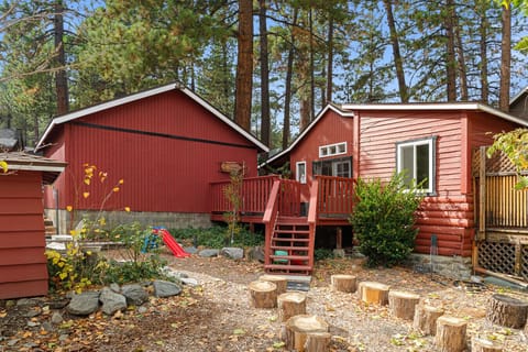 Nestled in the pines, Cozy Cottage offers two decks and a fully fenced-in yard.