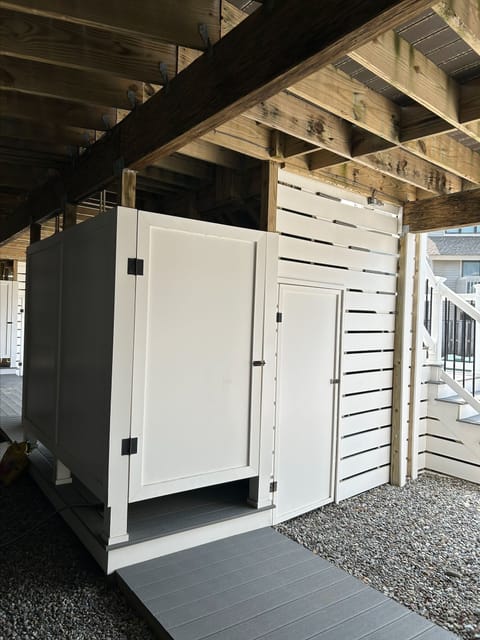 Outdoor shower and storage for beach gear!