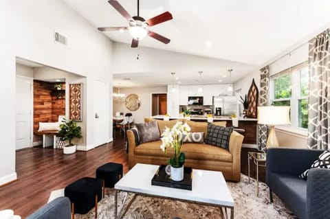 Unwind in a spacious living room with a perfect blend of comfort and style