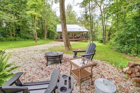 Cabin Exterior | Peaceful Wooded Surroundings | Wood-Burning Fire Pit