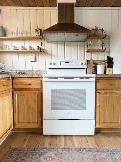 The kitchen has all you will need to cook a world-class meal (or a frozen pizza)