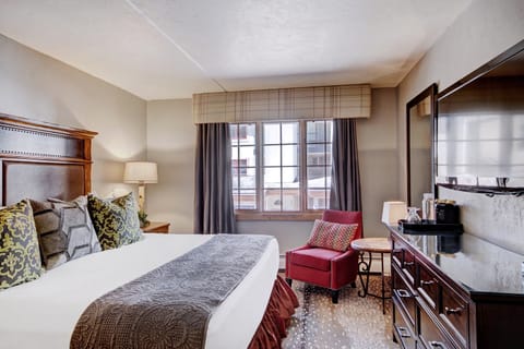 Sit back and enjoy watching a movie on the flat screen TV.