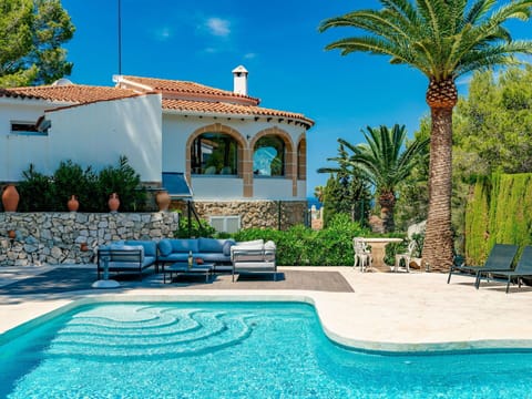 Water, Sky, Plant, Property, Green, Blue, Azure, Swimming Pool, Tree, Building
