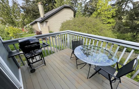 Uncovered Deck / Balcony with BBQ & Chairs (view #1)