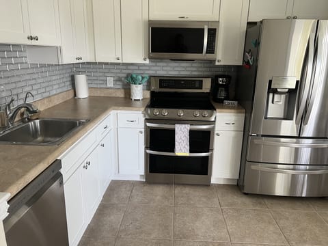Fully renovated and stocked kitchen for all you cooking needs