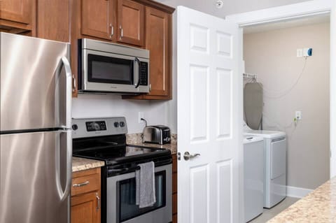 The laundry room can be found through the kitchen. 