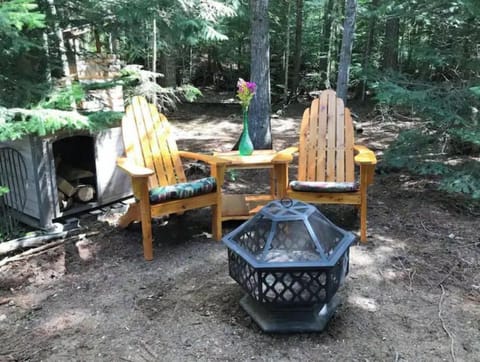 Private fire pit and outdoor kitchen and shower.