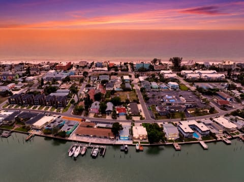 A bird's eye view of the home on the intracoastal at sunset!