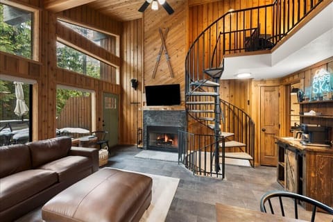 Living Room  with Fireplace and Large Leather Sectional