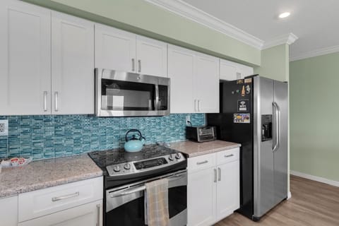 Electric range, microwave, and pots/pans/spices/etc - eat in if you prefer!