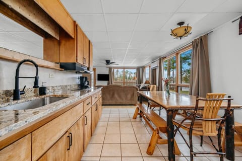 Updated granite countertops and finishes are accented by scenic views of Spider Lake.