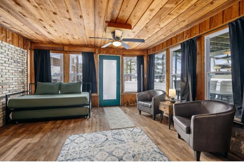 Enjoy bright views and rustic charm in this inviting space with comfy seating!