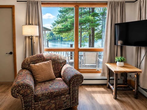 Living Room: Sun-soaked space with beautiful views, perfect for relaxation and family time!