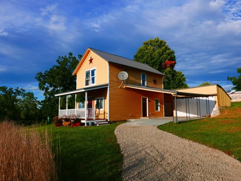 Entry to Property + Driveway + Carport