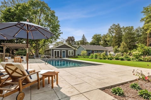 Large in-ground pool, patio furniture and Coach house