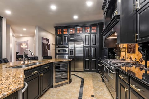 The coffee bar and wine fridge are open 24/7