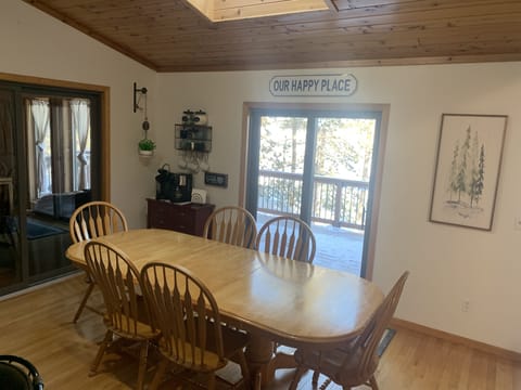 Large table and coffee bar.