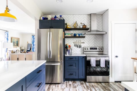 The drawers hold it all: immersion blender and hand mixer to children's dishes.