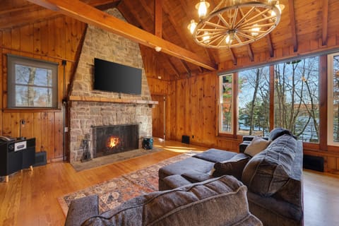 Cozy up on the couch in front of the fireplace 