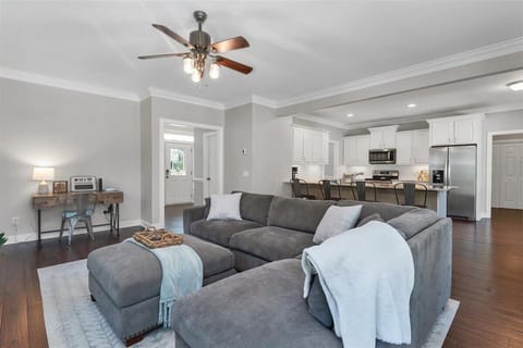 Living room with smart TV and workspace