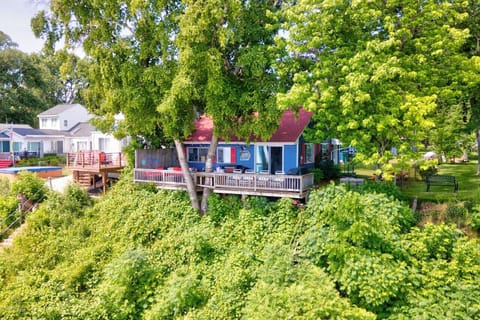 Home surrounded by beautiful lush greenery overlooking Lake Huron
