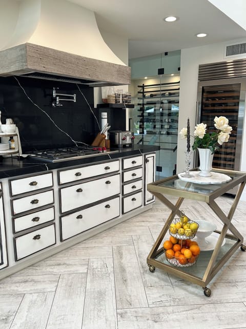 5 Burner Wolf Gas cooktop, Wolf 4 Slot Toaster, SubZero Wine Fridge, Quartz Tops