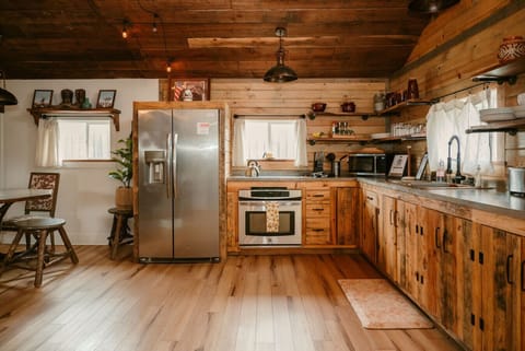 From coffee at sunrise to family dinners- this charming kitchen is ready for it all.