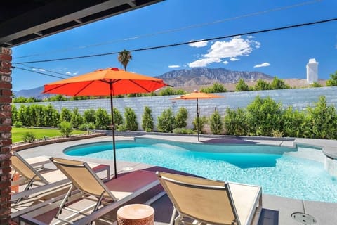 Poolside lounging with views of the gorgeous desert mountains and full size walls for privacy. 