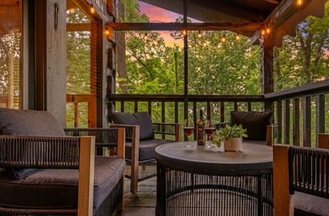 Catch the mountain views the moment you settle in — this porch is where lazy afternoons disappear.