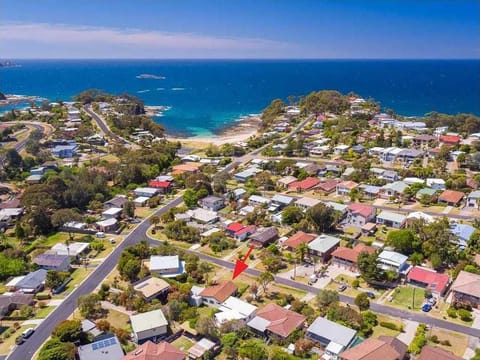 Only 400m walk to Garden Bay (pictured) and Malua Bay Surf Beach