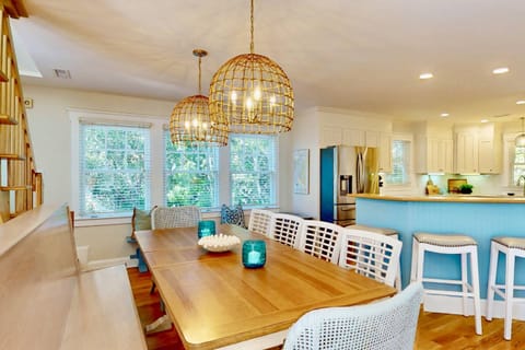 The modern coastal dining table is perfect to gather for a great evening meal