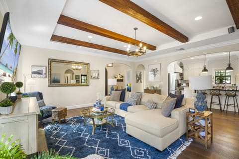 Whether it's a movie night with loved ones or simply lounging and enjoying each other's company, our palm-themed living area is the perfect gathering spot for quality time and making cherished memories.