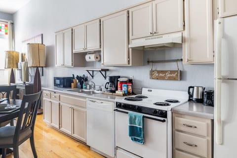 Full Kitchen includes all pots, pans, silverware, coffee maker, coffee, sugar, creamer, tea, blender, toaster, refrigerator, microwave, glasses, wine glasses and cooking/eating utensils