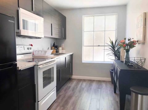 Full Kitchen includes all pots, pans, silverware, coffee maker, coffee, sugar, creamer, tea, blender, toaster, refrigerator, microwave, glasses, wine glasses and cooking/eating utensils