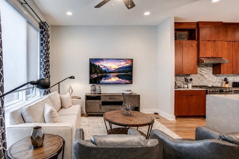 Cozy living room with plush seating, perfect for relaxing, streaming your favorite shows, and unwinding after a day of exploring.